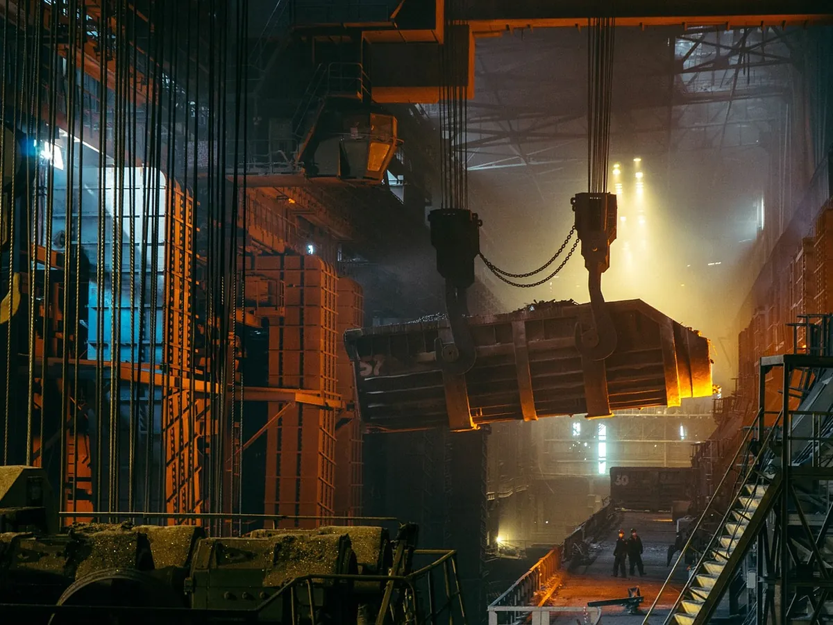 Illustrative image: ladle of molten steel in a steel foundry